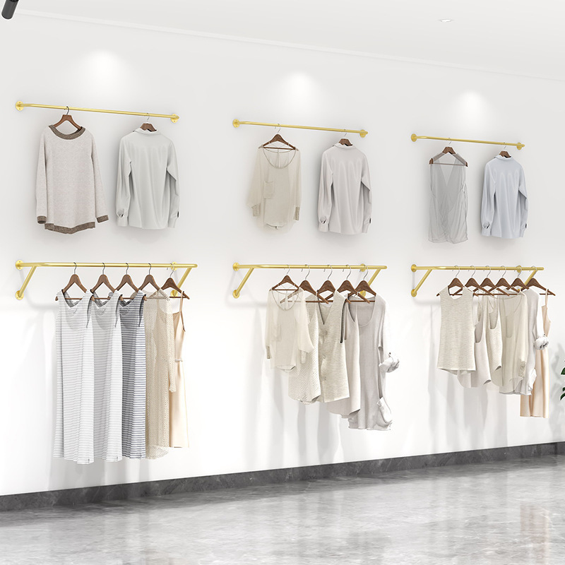 Wholesale clothes hanging for clothing store wall mounted garment rack boutique gold clothes rack