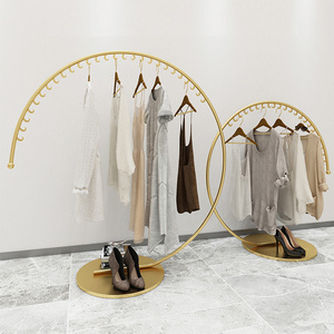 Clothes shop display racks shelf round side hanging clothes rack C shape gold clothing rack