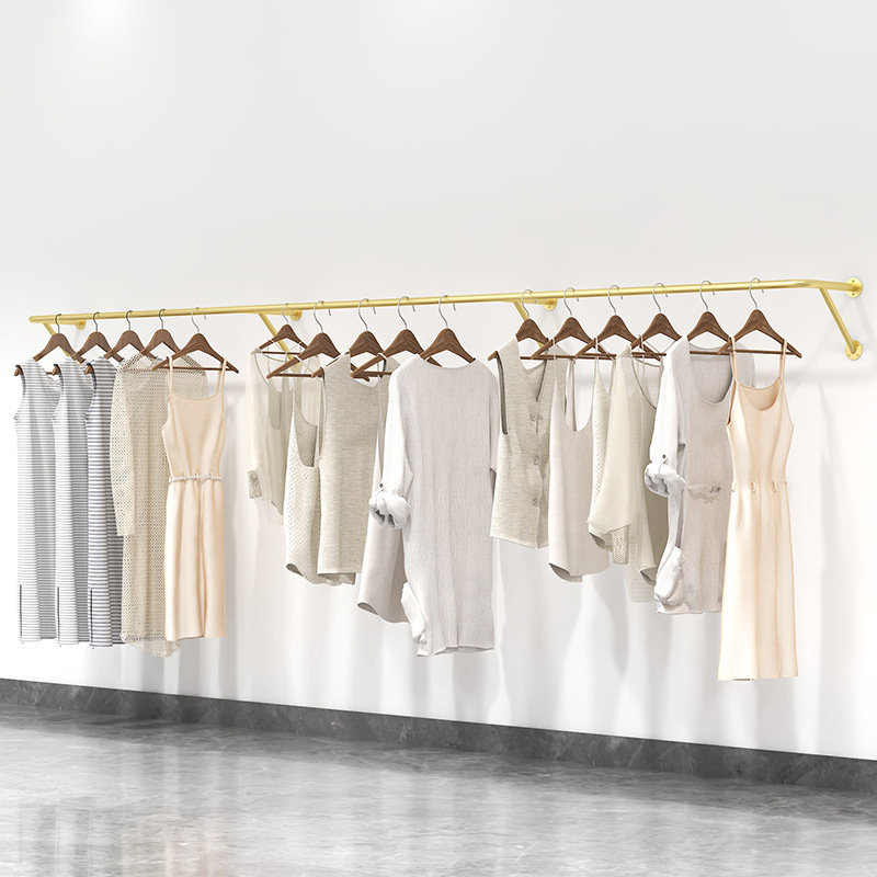 Wholesale clothes hanging for clothing store wall mounted garment rack boutique gold clothes rack