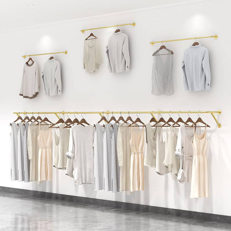 Wholesale clothes hanging for clothing store wall mounted garment rack boutique gold clothes rack