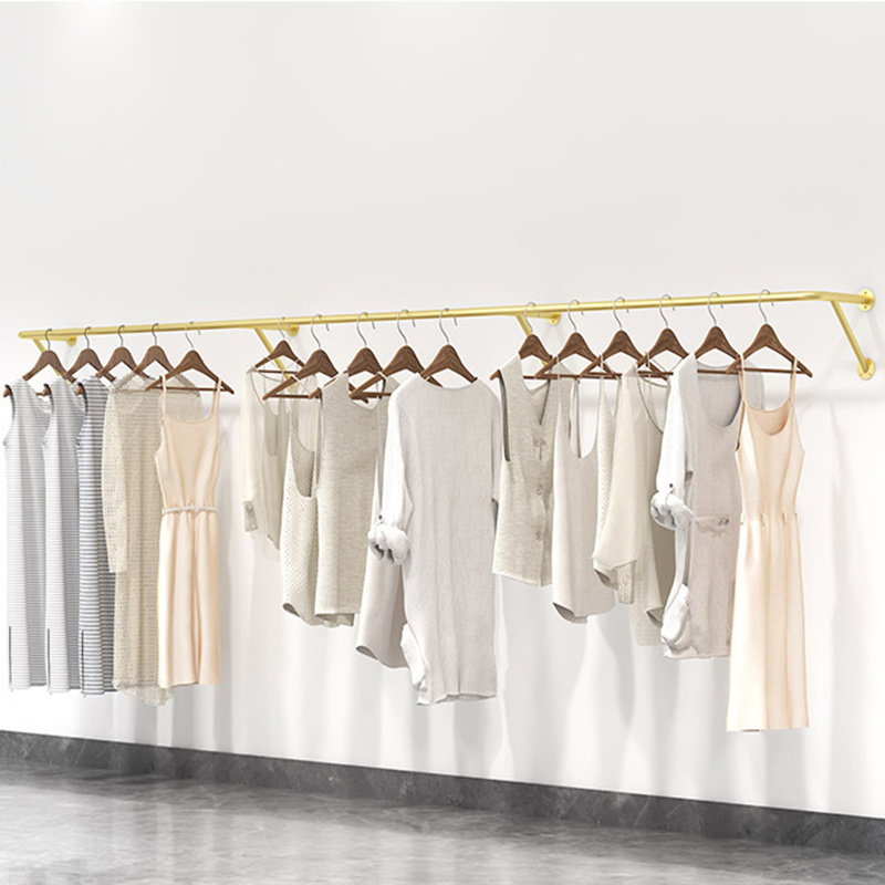 Wholesale clothes hanging for clothing store wall mounted garment rack boutique gold clothes rack