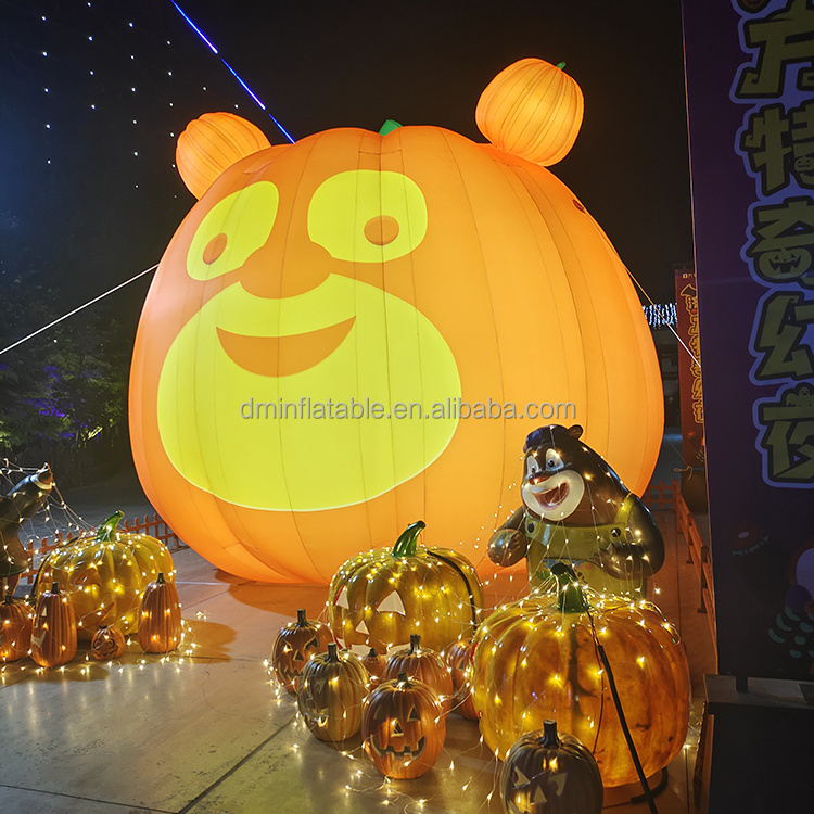 Giant inflatable pumpkin held a broom for advertising promotional event halloween decoration