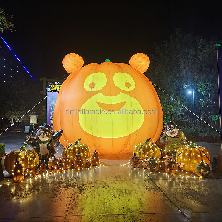 Giant inflatable pumpkin held a broom for advertising promotional event halloween decoration