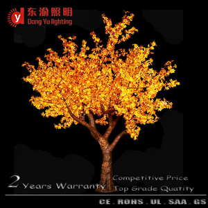 warm white light autumn artificial maple tree branches and leaves