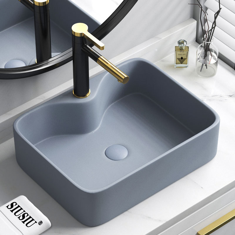 bathroom for hotel square modern counter top sink with hand art designs  gold colored ceramic sanitary wares wash basin