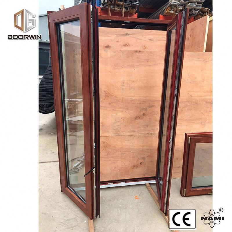 Aluminium and wood inward door glass tilt and turn window Wood cladding aluminium tilt and turn window with handle