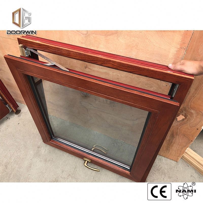 Aluminium and wood inward door glass tilt and turn window Wood cladding aluminium tilt and turn window with handle