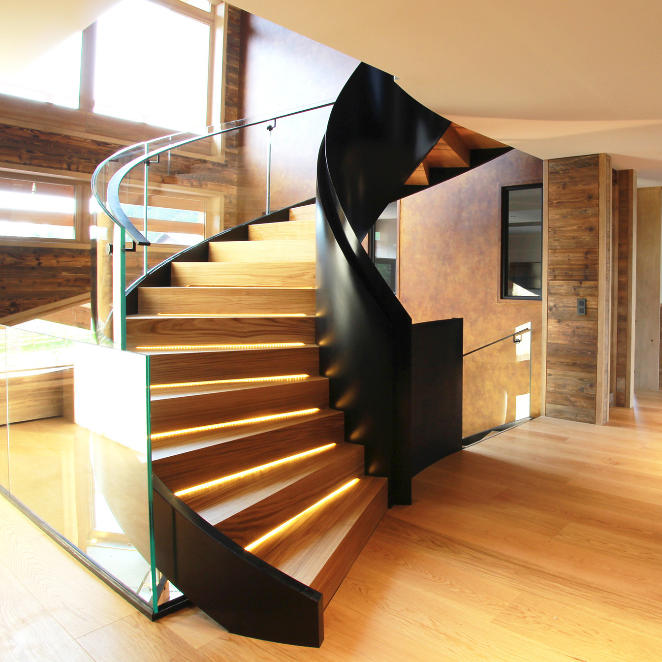 Villa modern indoor spiral staircase design with oak wooden step LED lights from Foshan stairs manufacturer