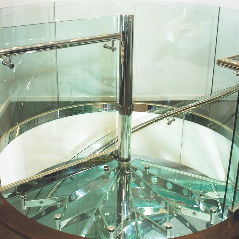 New stainless steel structure staircase design of modern glass spiral stairs for interior villa from Foshan factory