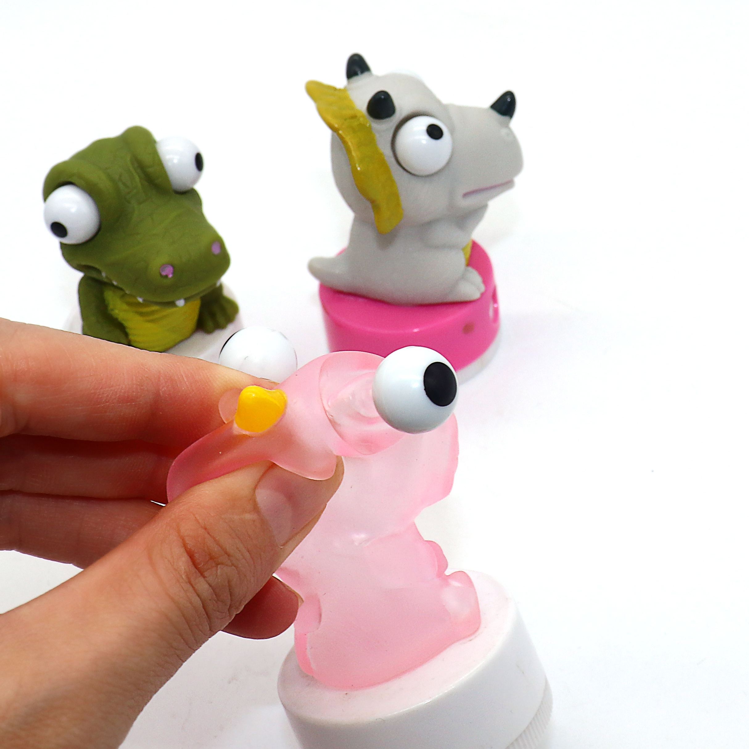 Promotional funny animal plastic pencil sharpener 3d eyes popper animal sharpener topper