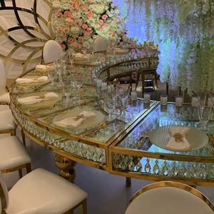 Foshan furniture golden stainless steel leg glass top serpentine wedding table