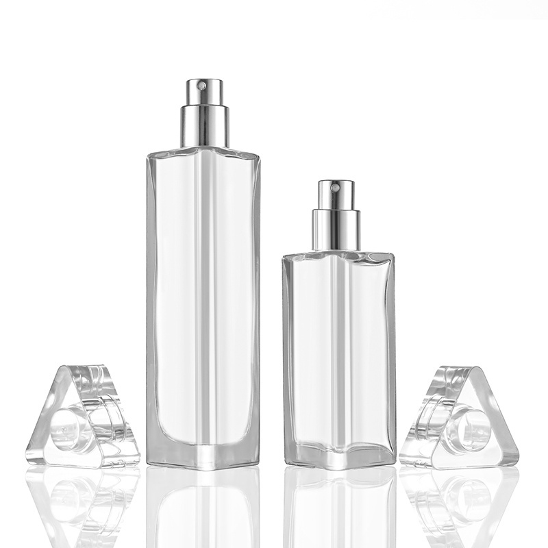 Wholesale Clear Triangle Shape Perfume Bottles 30ml 50ml Empty Glass Perfume Spray Bottle With Paper Tube