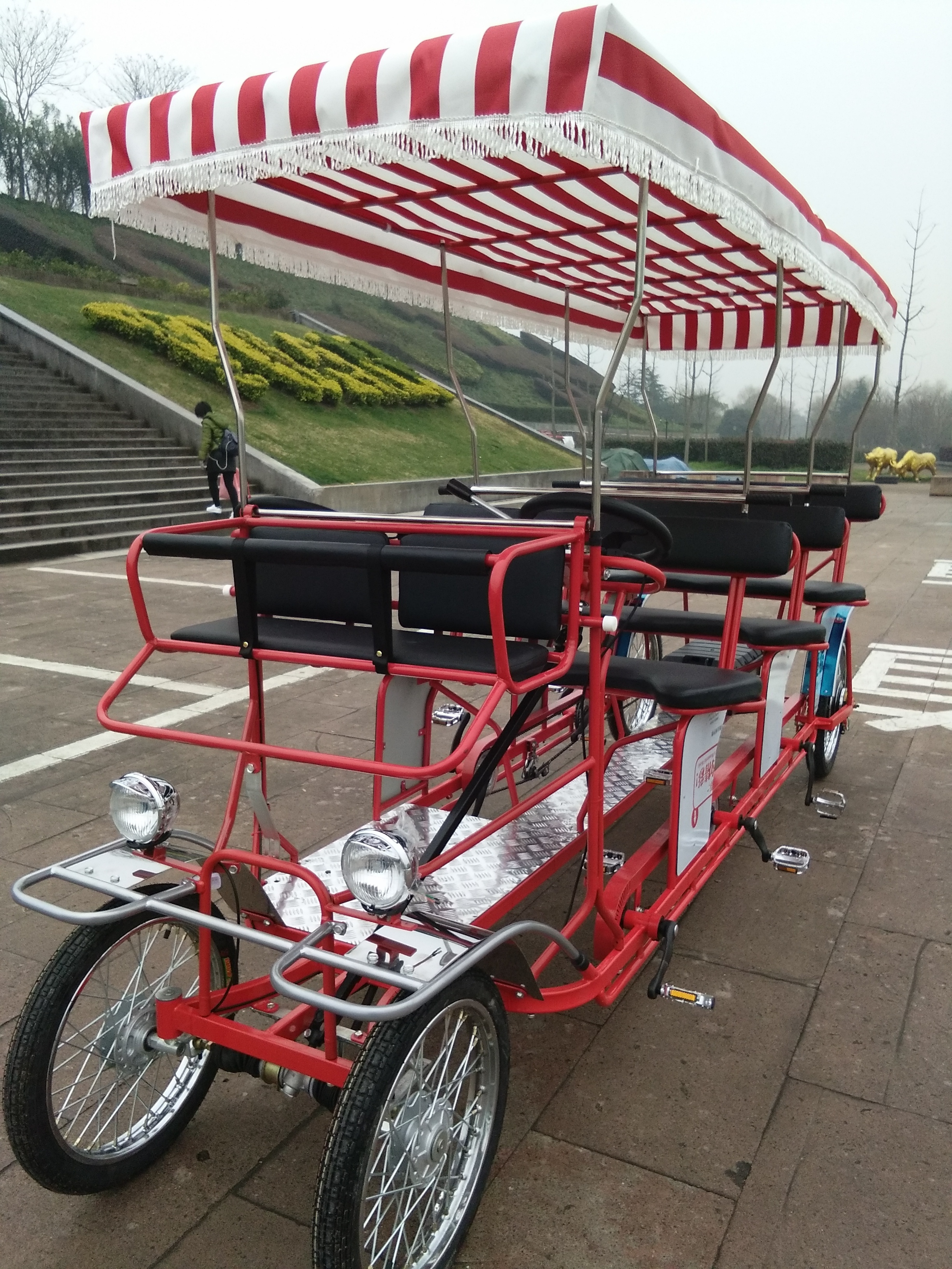 EX-SIZE 6 PERSON   SURREY BIKE WITH LED LIGHTS AND FRONT BABY SEAT QUAD CYCLE