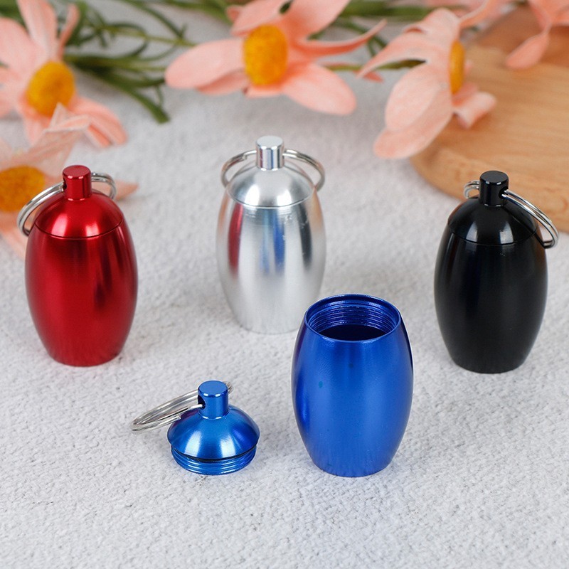 Oval Medicine Bottle Sealed keyring Cabin Medicine Can Egg shaped Key Chain Waterproof Hanger Ear Plug Storage Box key holders