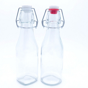 250ml 500ml 750ml 1000ml buckle glass bottle round glass bottle with swing top for cold brew coffee/beer wholesale