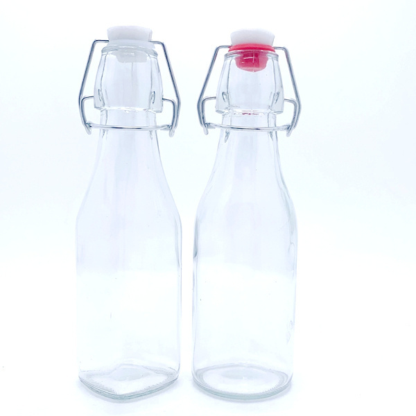 Wholesale Clear Flip Top Bottle 250ml 16oz 750ml 1 Liter Glass Swing Top Glass Bottle factory price