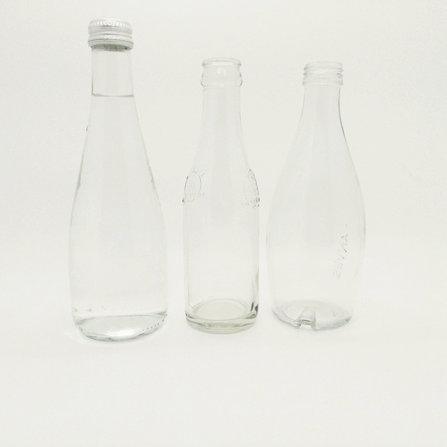 Factory wholesale 500ml clear glass bottle drink glass bottle with screw cap high end mineral water glass bottle