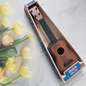 Easttop Four String 16" Ukulele Carving Wholesale Ukulele China Lovers Body Head String Packaging ABS Material