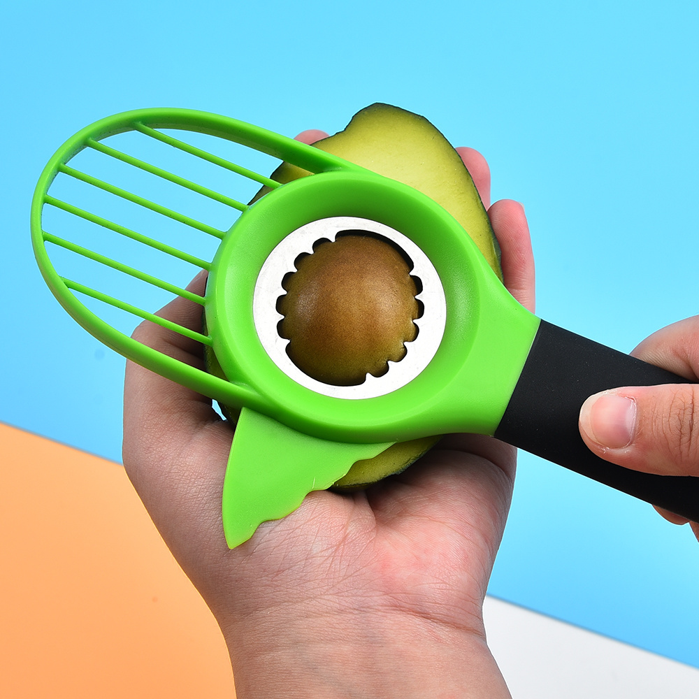 Good grip handle green multi functional kiwi knife hand shape 3 in 1 plastic avocado slicer cutter