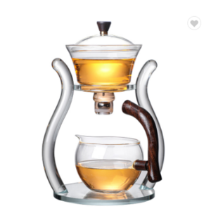 Q magnetic water diversion rotating cover bowl semi-automatic Heat-resistant glass tea set