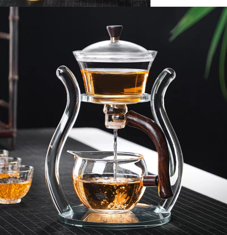 Q magnetic water diversion rotating cover bowl semi-automatic Heat-resistant glass tea set