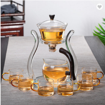 Q magnetic water diversion rotating cover bowl semi-automatic Heat-resistant glass tea set