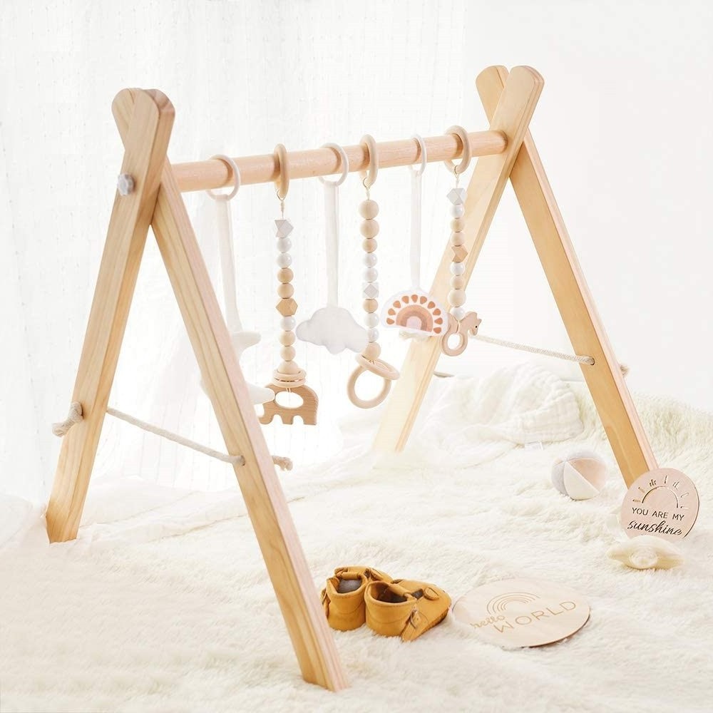 Wholesale wooden baby activity gym toys 100% natural wood safe and durable for babies ready to export