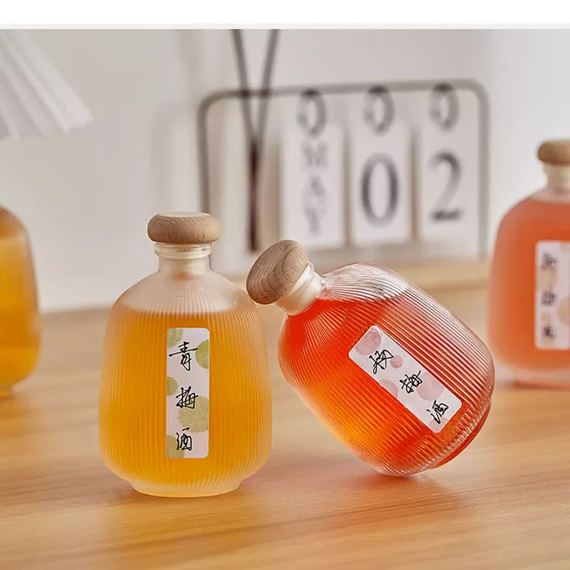 Hot sale empty cheaper transparent vertical stripe fruit wine peach blossom cherry green plum fruit wine glass bottle with cork