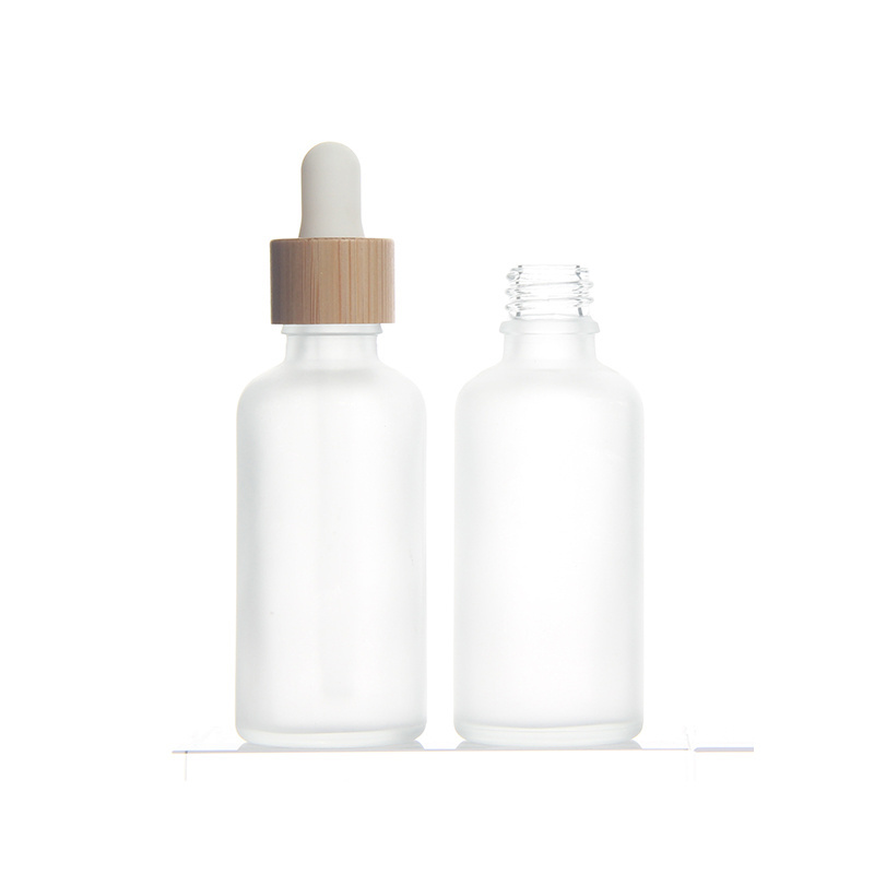 Stock Products 5ml 10ml 15ml 20ml 30ml 50ml 100ml Frost Glass Bottle Bamboo Dropper Bottle Essential Oil Serum Container