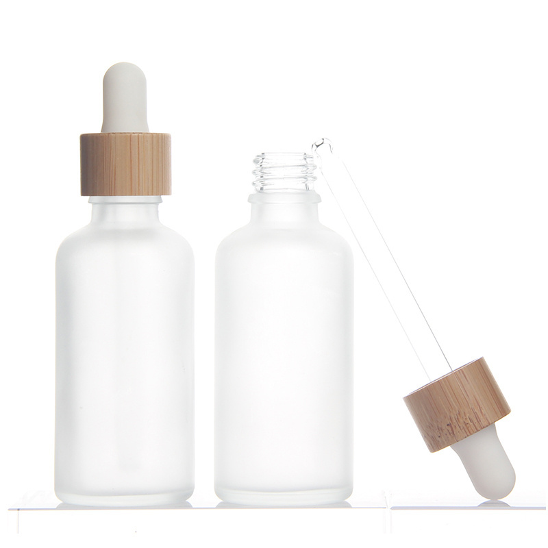 Stock Products 5ml 10ml 15ml 20ml 30ml 50ml 100ml Frost Glass Bottle Bamboo Dropper Bottle Essential Oil Serum Container