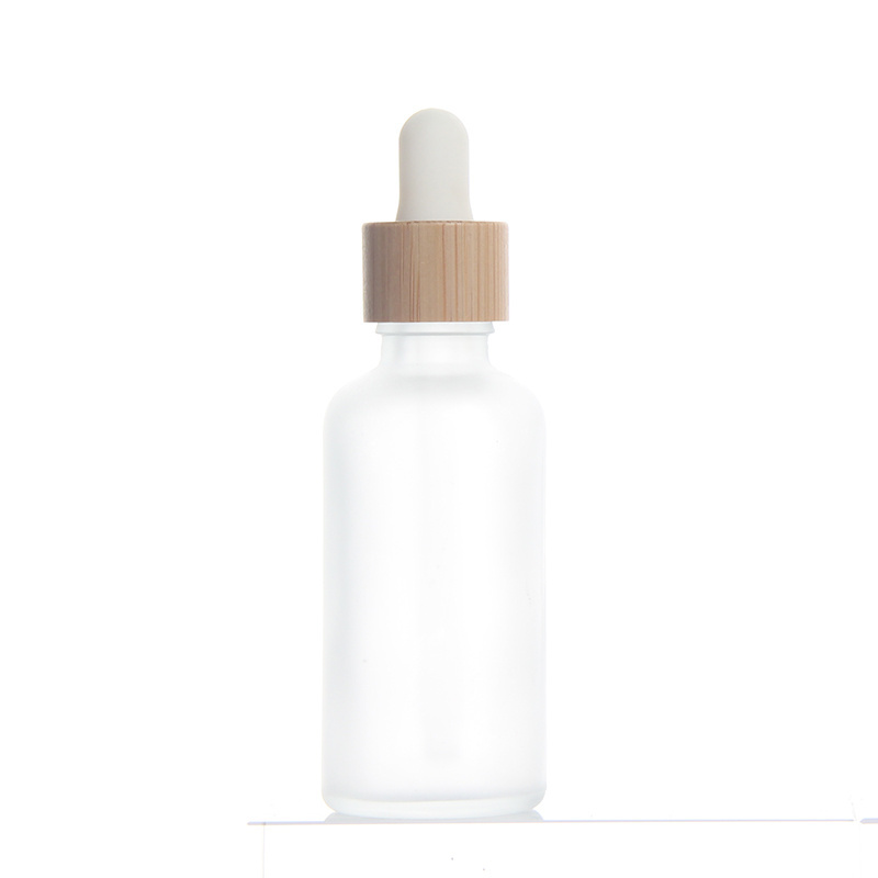 Stock Products 5ml 10ml 15ml 20ml 30ml 50ml 100ml Frost Glass Bottle Bamboo Dropper Bottle Essential Oil Serum Container