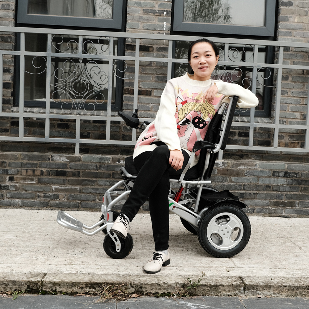 Aluminum Alloy Child power Wheel chair Shock Absorber cheapest Electric Wheelchair