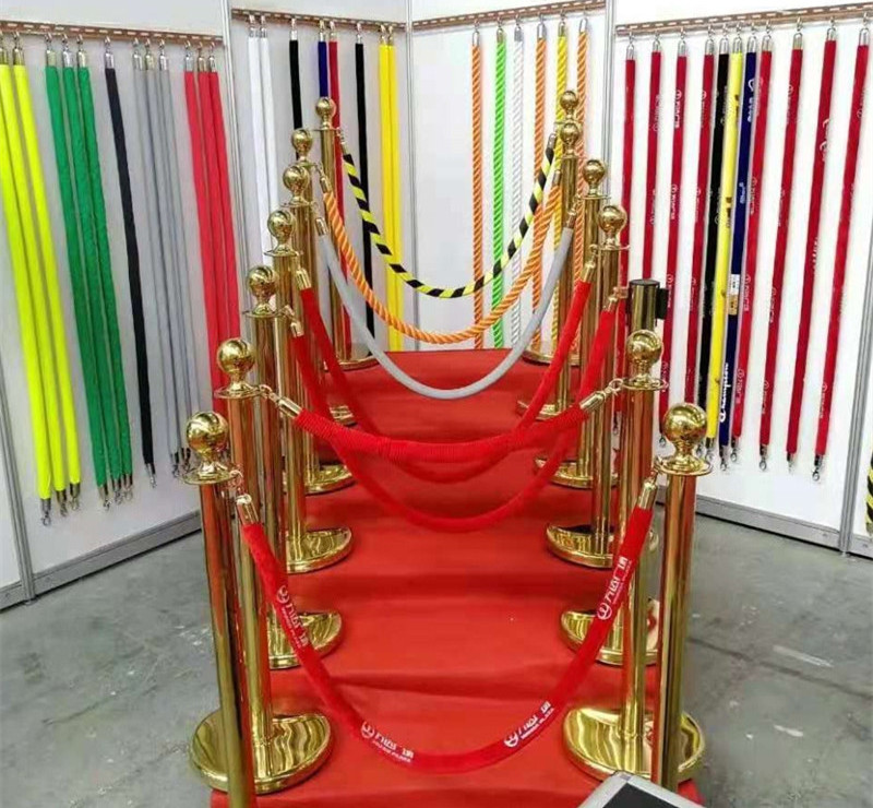 Traffic crowd control walkway gold queue bollard red carpet velvet rope poles and stands post barrier gold stanchion