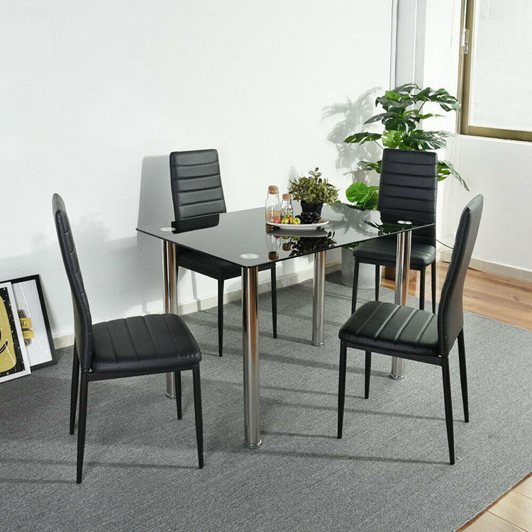 China Factory sale modern design dining room furniture black tempered glass top tables and chairs cheap dining table set