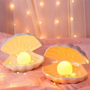 Nordic net red creative sea shell nightlight bedroom bed pearl lamp girl heart dream ceramic lamp tabletop decoration