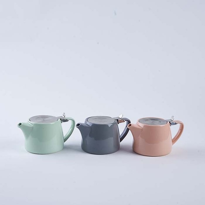 Hot selling cute porcelain ceramic tea pot tea kettle with infuser