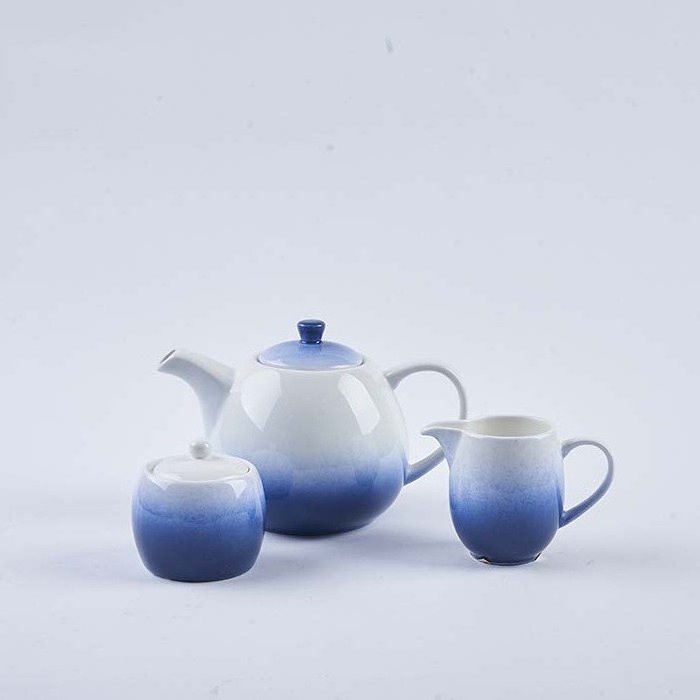 Hot selling cute porcelain ceramic tea pot tea kettle with infuser