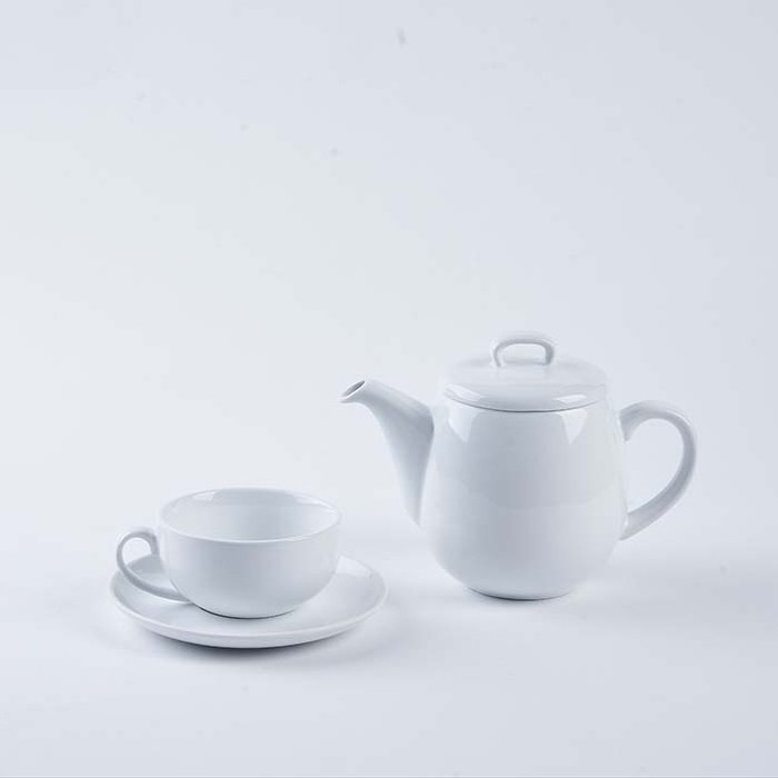 Hot selling cute porcelain ceramic tea pot tea kettle with infuser