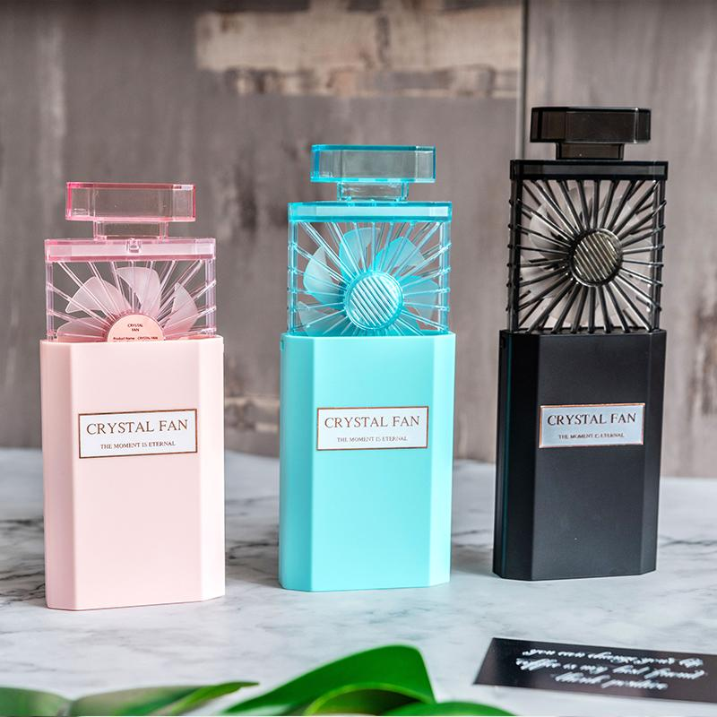 Hot Sale Perfume Bottle Design Mini Fan with Scented Piece USB Rechargeable Outdoor Foldable Silent Electric Cooler Fan