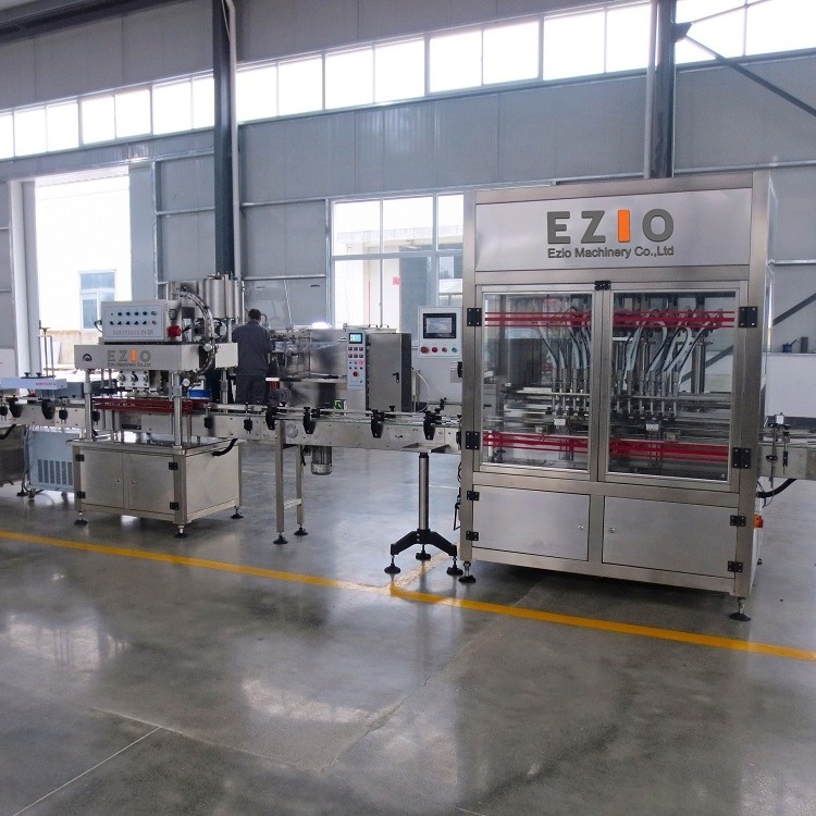 Factory Supply 4 Nozzle Sweetened Condensed Milk Curd Bottle Fillign And Capping Machine / Liquid Yogurt Filling Line