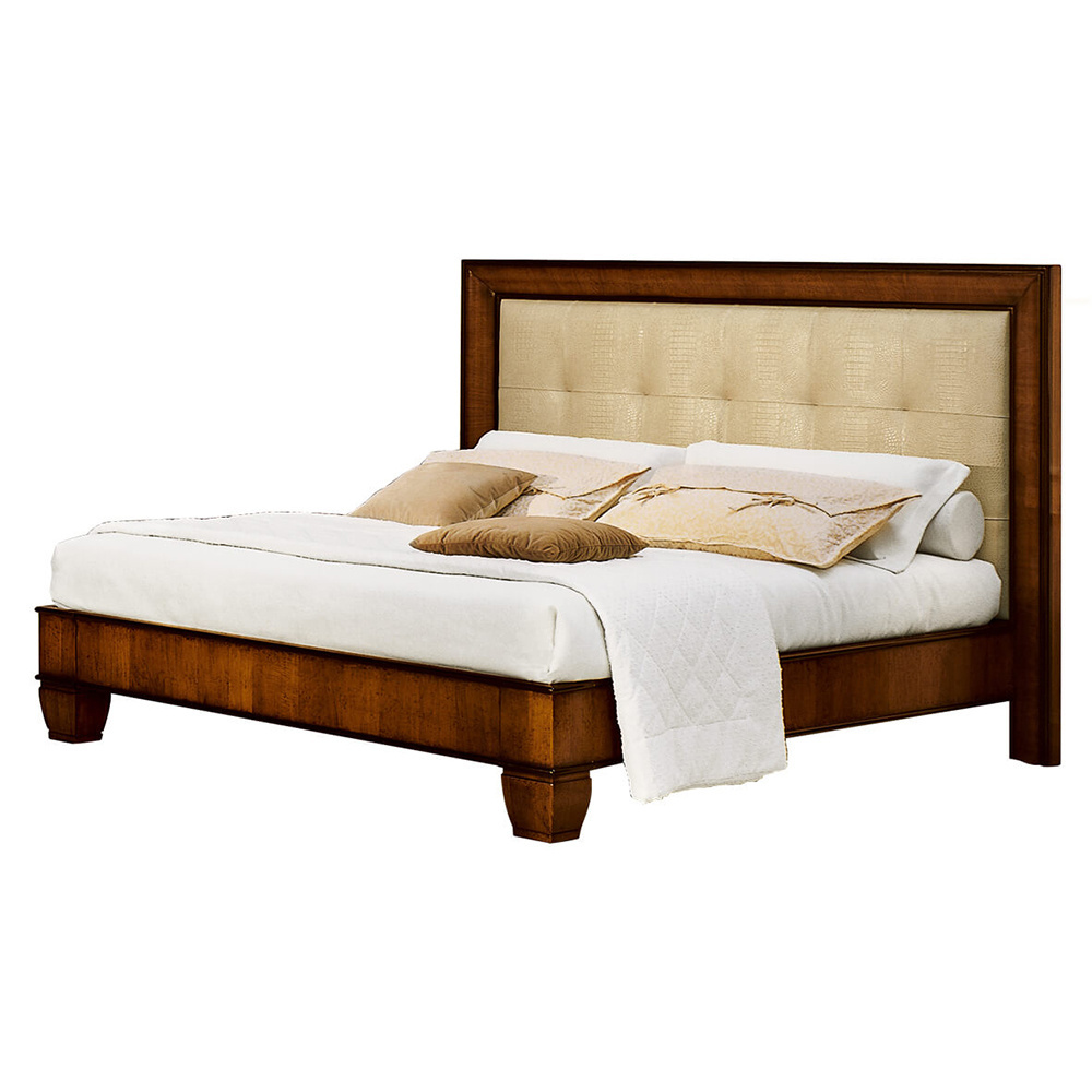 Cappella is a king-size bed. Headboard with shaped frame in walnut crotch veneer and blind tufting, bed frame in walnut