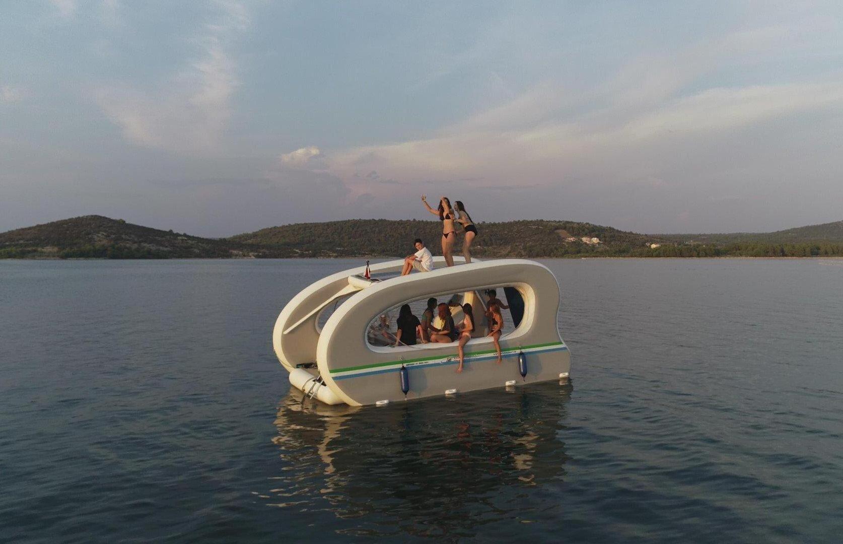 Spatium ELECTRICAT  the sun-powered fun powered Catamaran Cruising  Pontoon  foldable inflatable Solar house boat