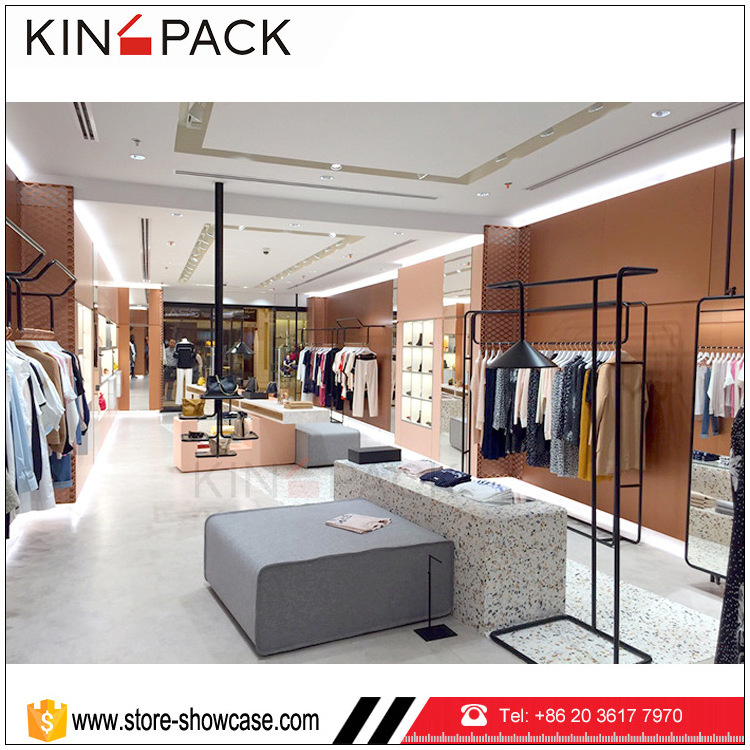 Retail store clothing display ideas of Lady clothes shop interior design garment display stand