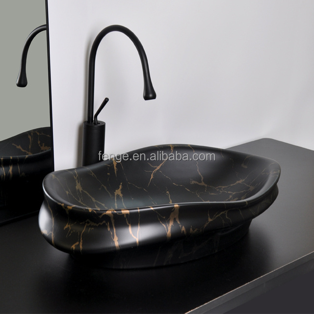 Super Fashion China Artistic Handmade Ceramic Wash Basin Lavobo Counter Top Porcelain Wash Basin For Hotel