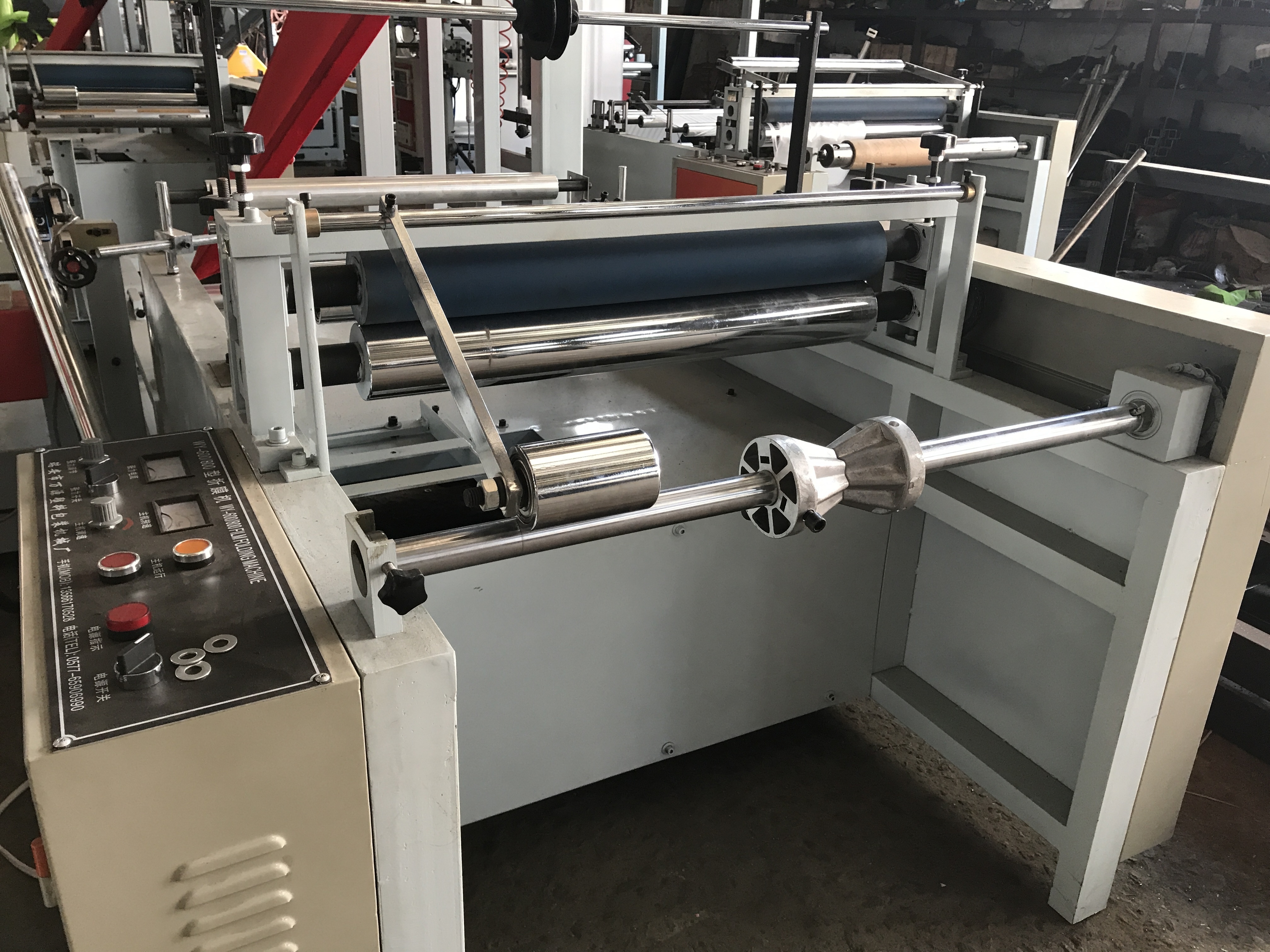 Plastic Film Folding and Rewinding Machine for PE BOPP Non Woven Fabric