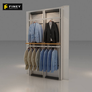 Modern Retail Clothes Shop Interior Decoration Layout Design Customized Store Display Shelves Clothing Store Rack Display