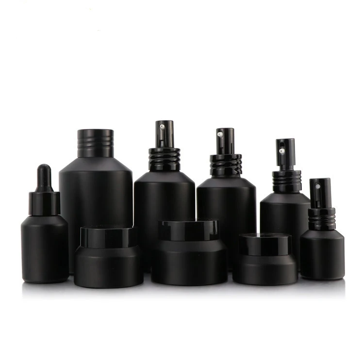 cosmetic packaging black bottles 2oz glass dropper bottle 50ml 60ml beard oil bottles with black matte aluminum pump dropper