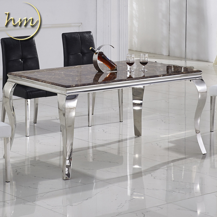 Upscale stainless steel dining table with marble glass top for hotel