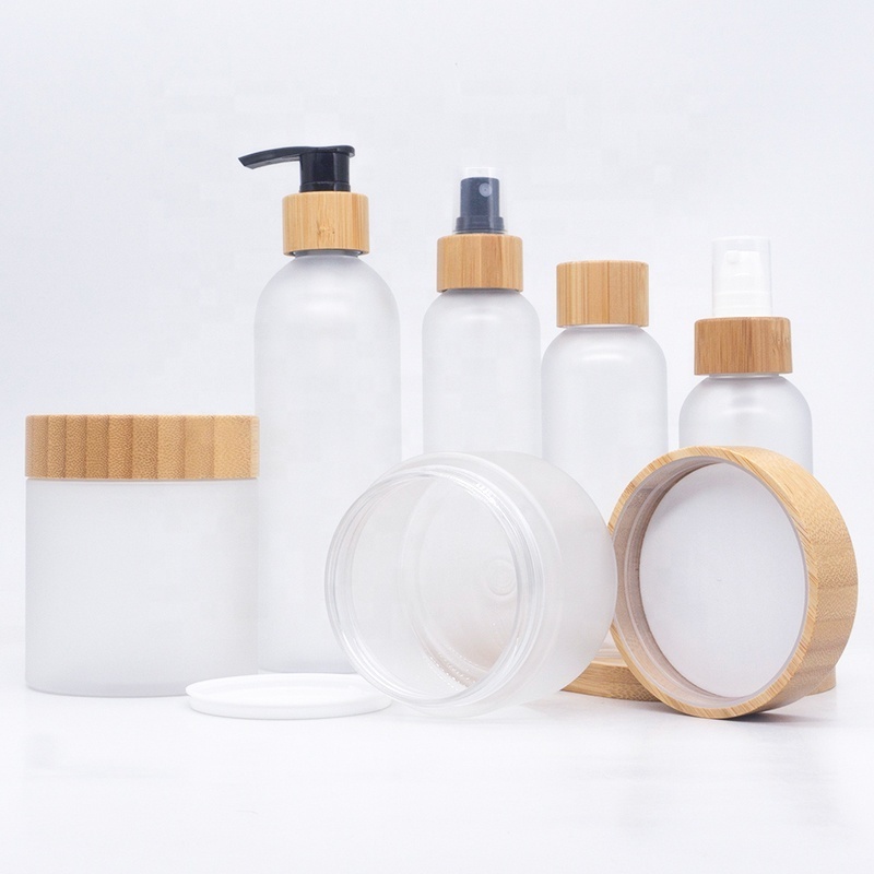 Cosmetic Packing 8oz bamboo shampoo pump bottle 4oz 250ml 16oz clear Frost Plastic Lotion oil Bottle With Bamboo spray pump disc