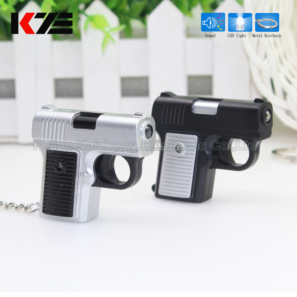 New style mini gun shape flashlight led keychain toy light and sound